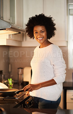 Buy stock photo Black woman, portrait and cooking on stove in home, frying pan and meal preparation in kitchen. Female person, apartment and nutrition in food, diet and skill for cuisine on gas for dinner routine