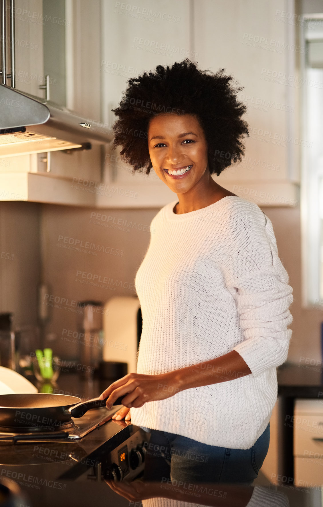 Buy stock photo Black woman, portrait and cooking on stove in home, frying pan and meal preparation in kitchen. Female person, apartment and nutrition in food, diet and skill for cuisine on gas for dinner routine