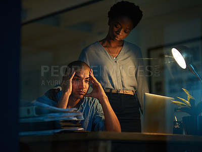 Buy stock photo Cropped shot of a young businessman looking stressed out while a colleague tries to console him