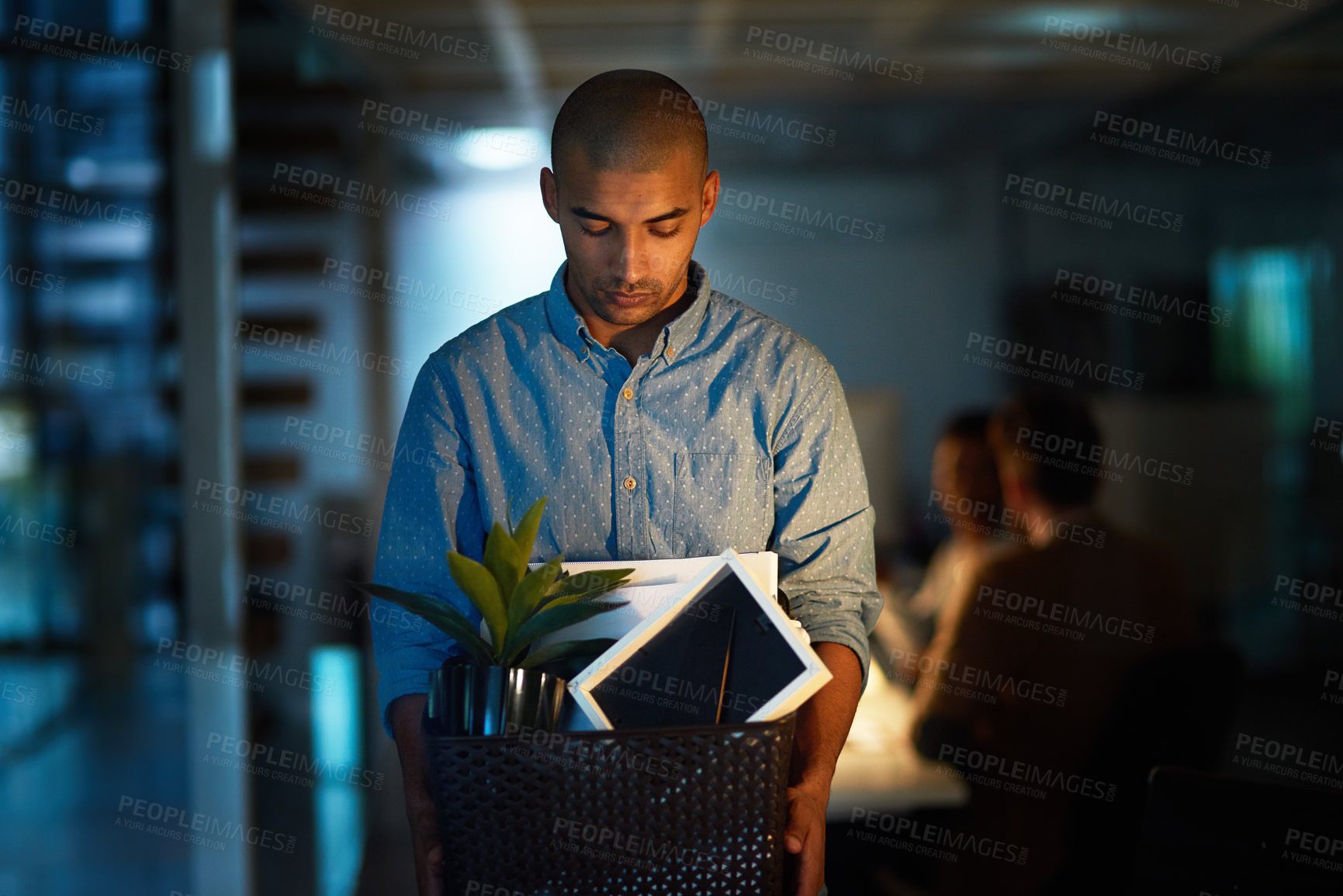 Buy stock photo Businessman, sad and fired with box in office for unemployed, mistake or night. Male person, dark and unhappy for jobless failure or worker depression with career termination, leaving or recession