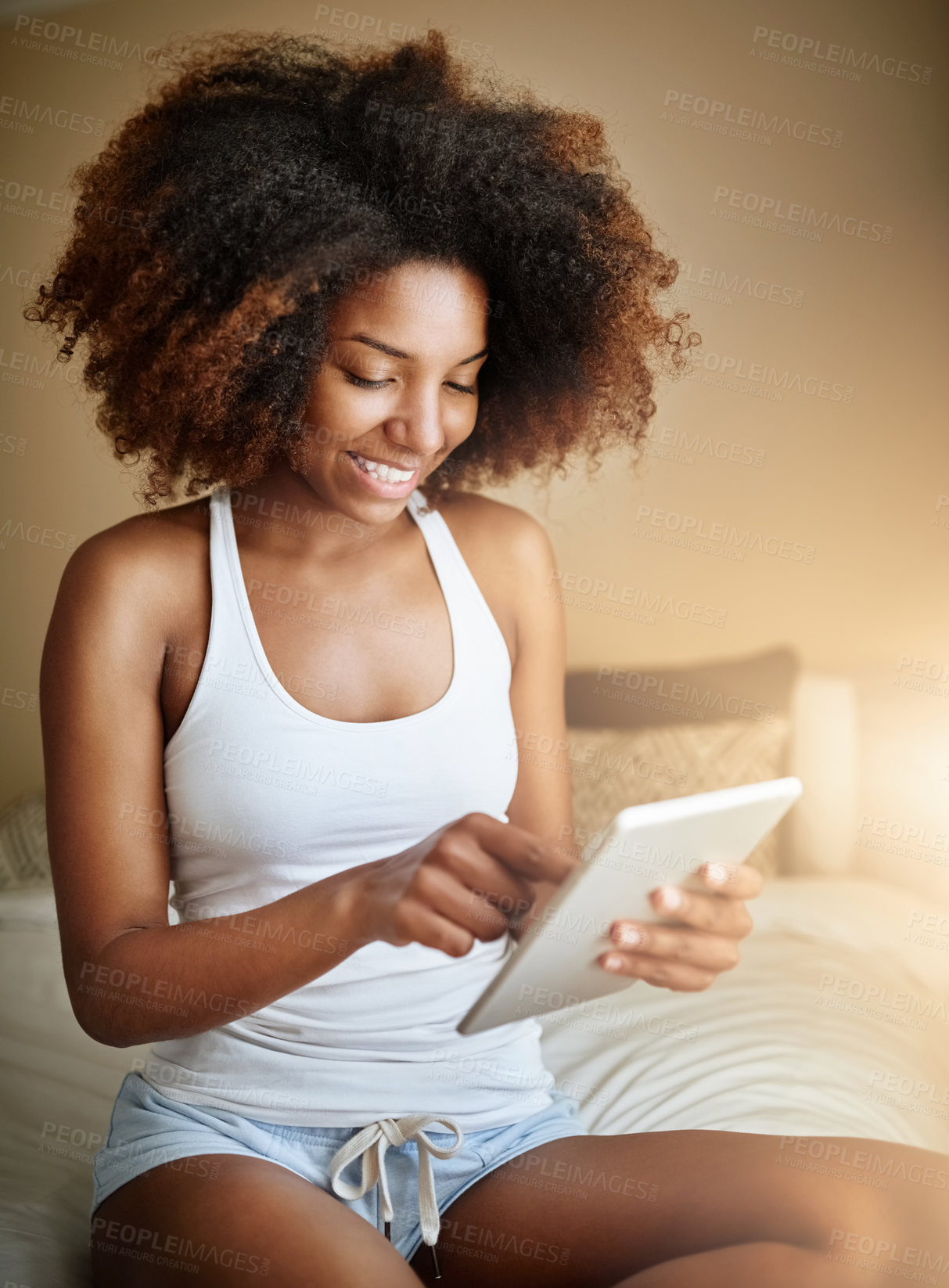 Buy stock photo Woman, happy or tablet on bed in home for checking notifications, social media scroll or reading morning news. African girl, person or relax in bedroom with technology for online shopping or browsing