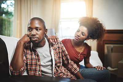 Buy stock photo Cropped shot of a young couple having relationship problems at home