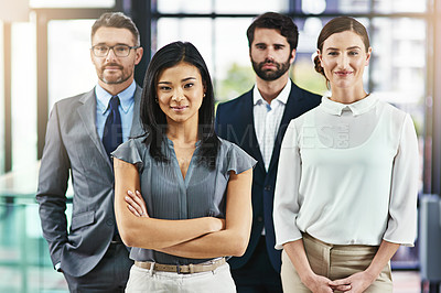 Buy stock photo Portrait of a group of colleagues standing together in an office