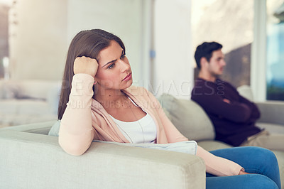 Buy stock photo Portrait of a young woman giving her husband the silent treatment after a fight