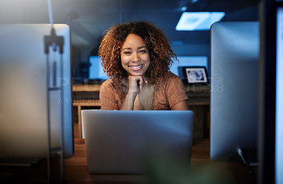 Buy stock photo Portrait of a young woman working late in an empty office