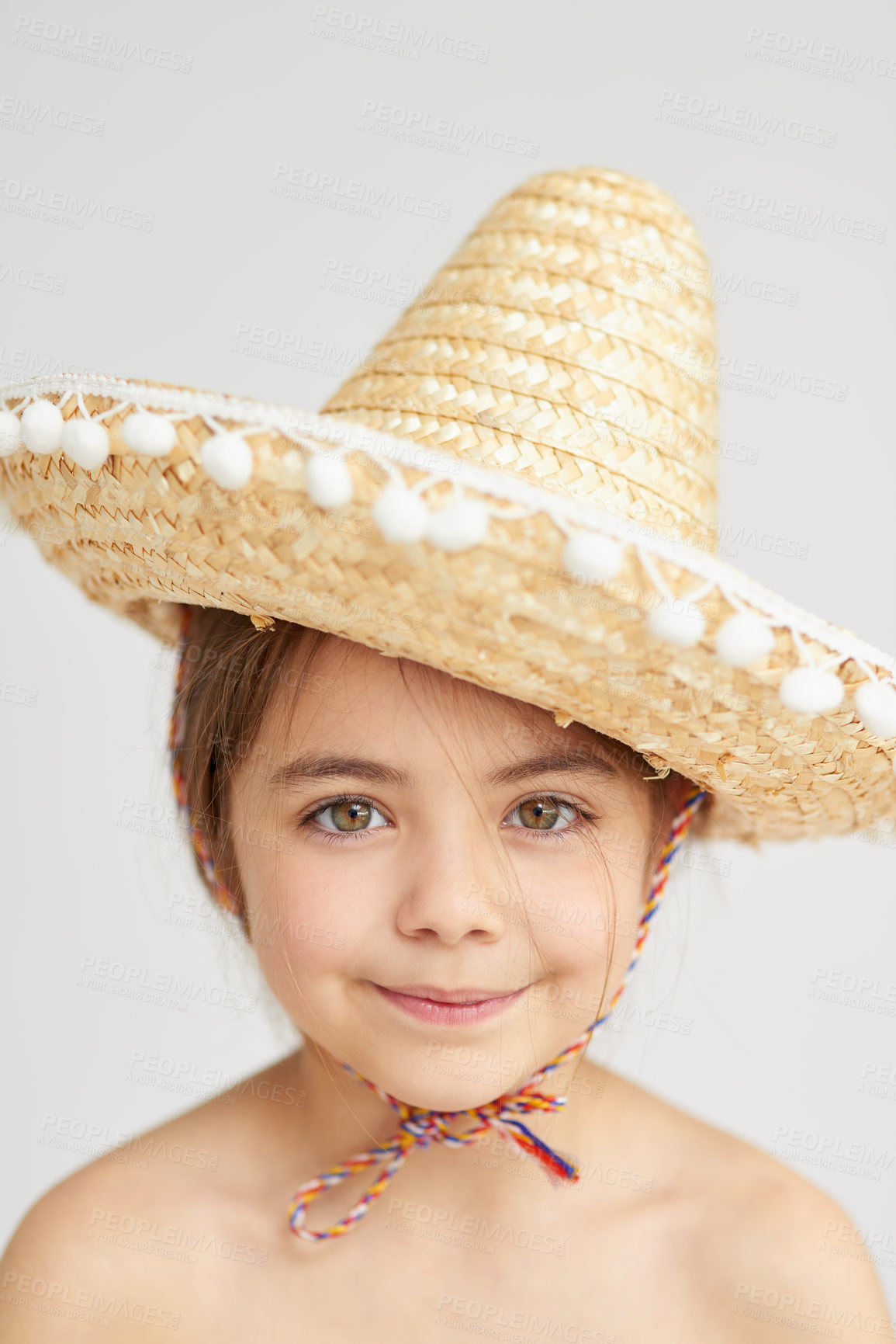 Buy stock photo Fashion, straw hat and portrait of child in studio with traditional Mexican costume for halloween. Smile, confident and girl kid with accessory for cosplay, dress up or apparel by gray background.