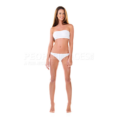 Buy stock photo Studio portrait of a beautiful young brunette woman in a white bikini isolated on white