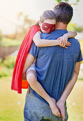 Buy stock photo Cropped shot of a little girl being comforted by her father outside