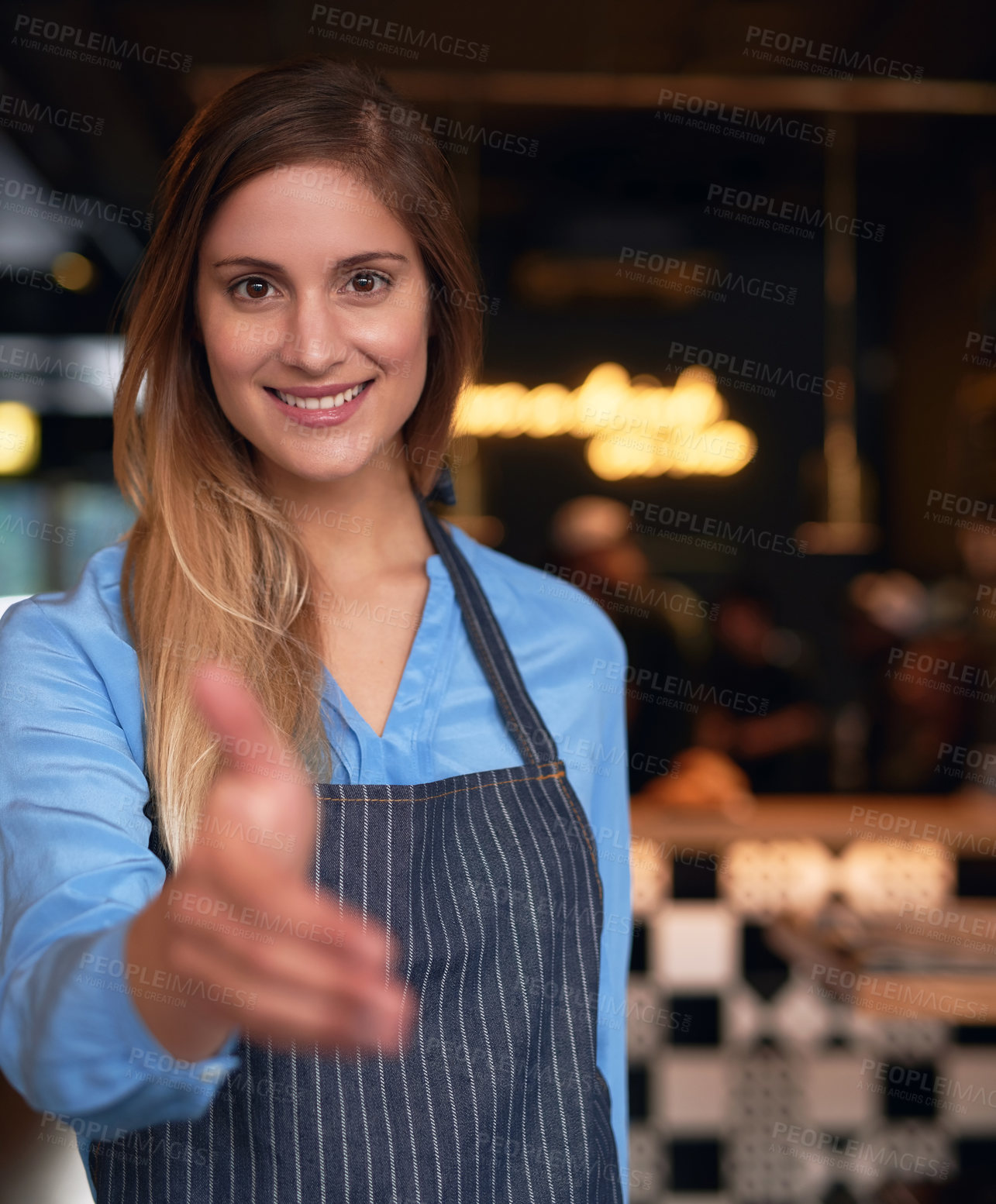 Buy stock photo Cropped portrait of an attractive young woman welcoming you into her coffee shop