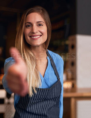 Buy stock photo Cropped portrait of an attractive young woman welcoming you into her coffee shop