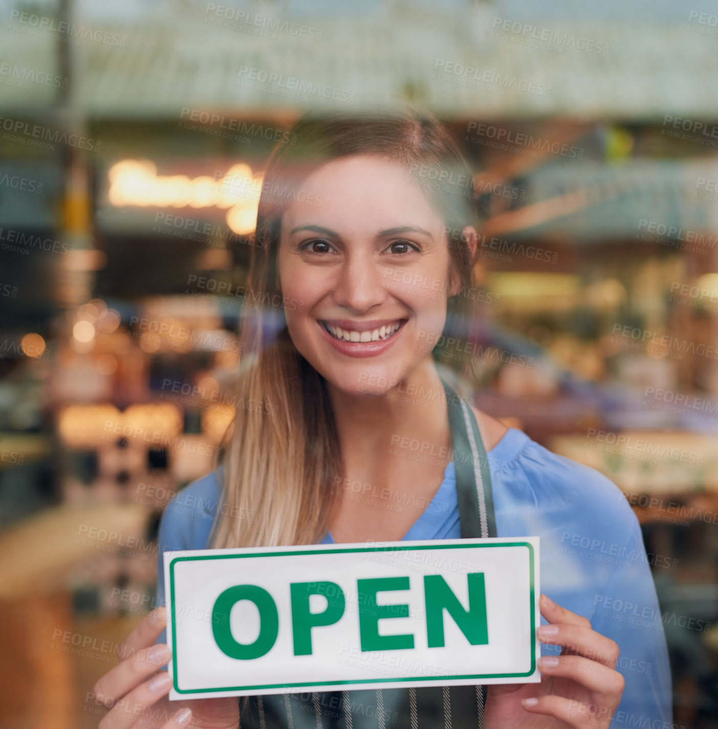Buy stock photo Cropped portrait of an attractive young woman opening up her coffee shop