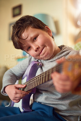 Buy stock photo Boy, electric guitar and portrait in home for music or performance, learning or development with creativity. Male child, instrument and bedroom for education in house, hopeful musician with smile