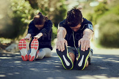 Buy stock photo Couple, stretching legs and runner before fitness, exercise and workout on road outdoor. People, man and woman with warm up for health, wellness and flexibility with endurance for motivation