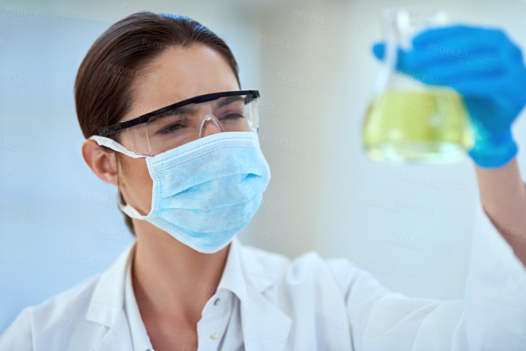 Buy stock photo Woman, scientist and chemical in glass for healthcare experiment, reaction and research. Scientific, musk and test tube with scientific study or innovation for vaccine, cure and treatment or medicine