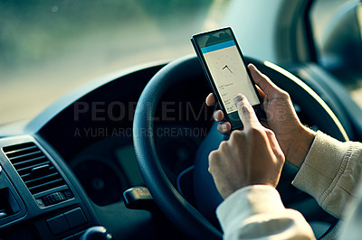 Buy stock photo Closeup shot of an unidentifiable delivery man using a cellphone while sitting in his van