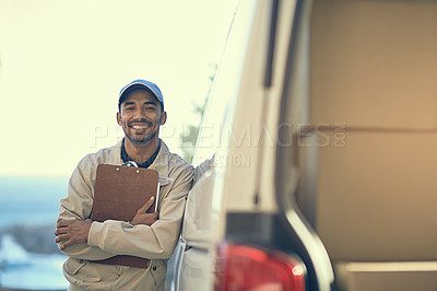 Buy stock photo Portrait of a delivery man standing next to his van