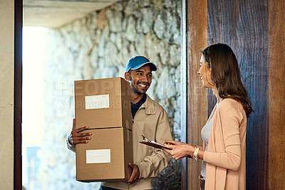Buy stock photo Cropped shot of a courier making a delivery to a customer at her home