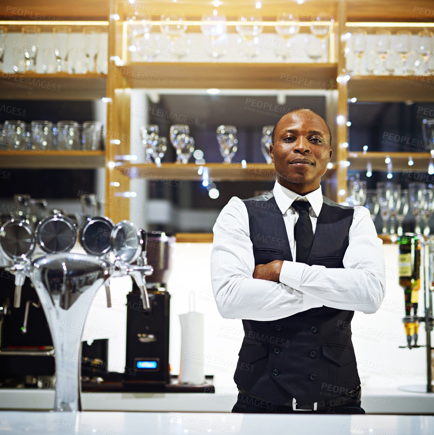 Buy stock photo Black man, bartender and confident portrait for service, hospitality and employee for alcohol. Male person, wine glasses and arms crossed at winery or hotel bar, waiter pride and professional barman