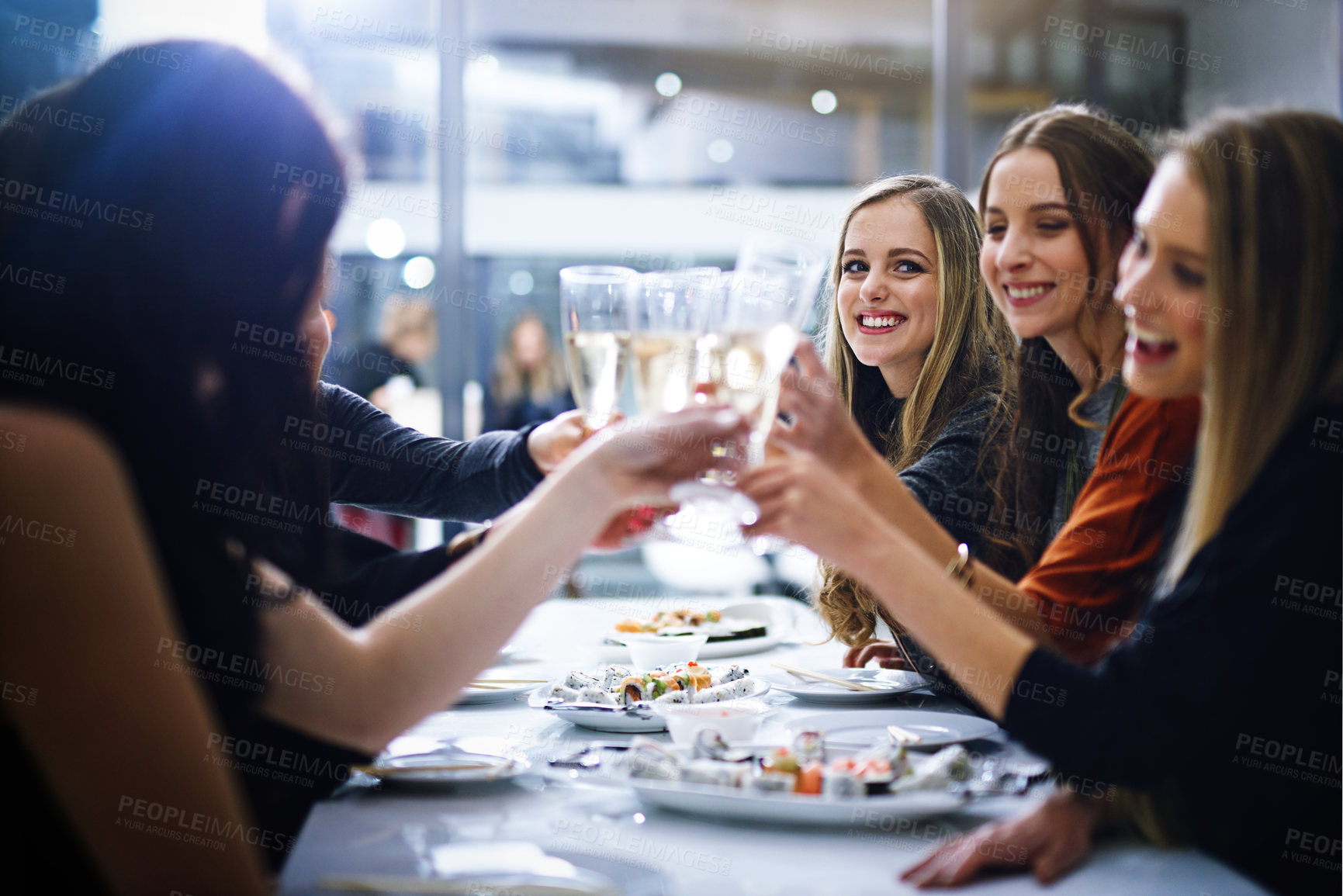 Buy stock photo Friends, happy and toast in restaurant for party, event or nightlife, bonding and friendship with fun or laughter. Group, wine and alcohol with excitement for celebration, birthday and social drink