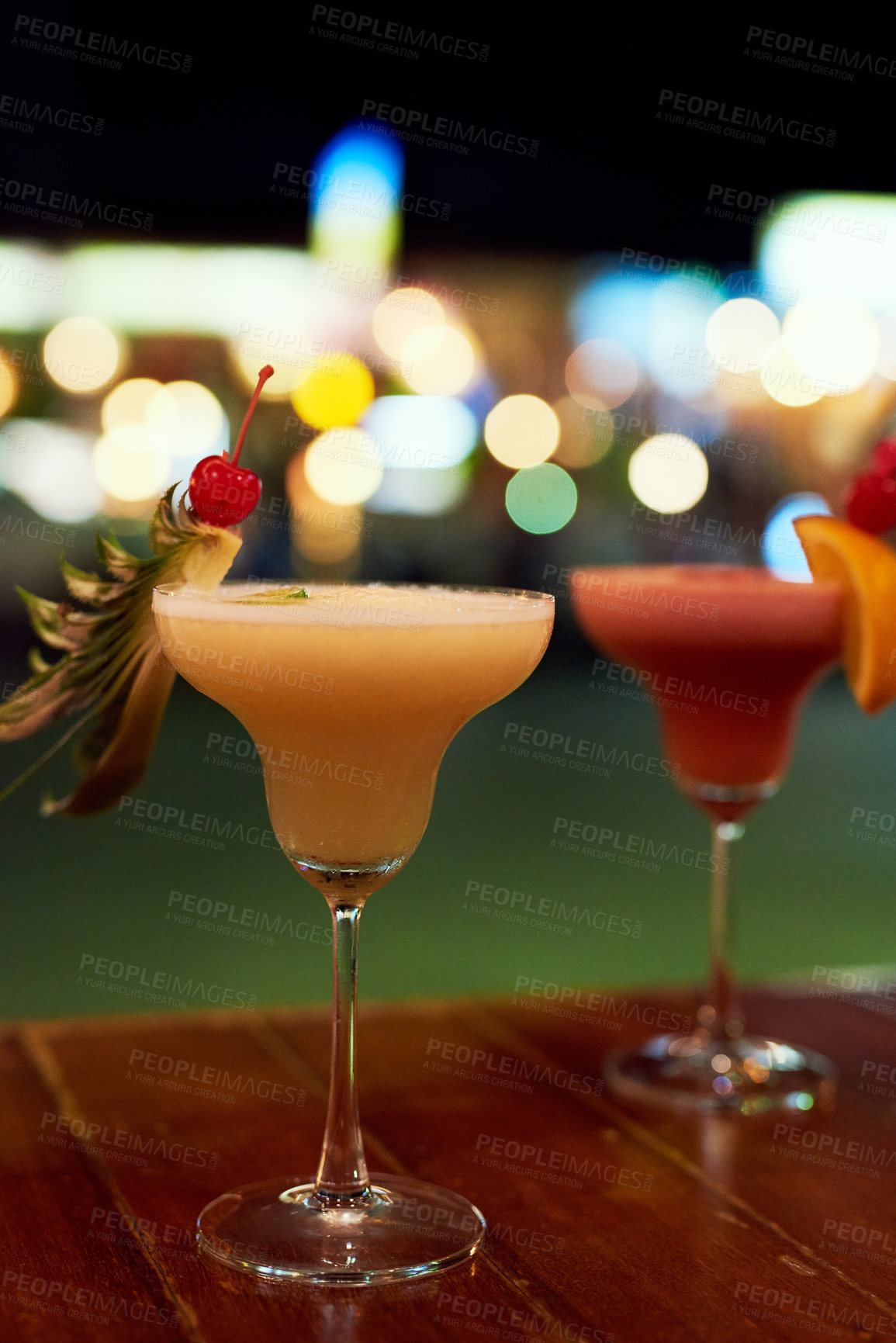 Buy stock photo Table, beverage or cocktails in nightclub for party with happy hour and weekend entertainment. Margarita or mojito, fruit and drink in restaurant with alcohol glasses for celebration in Costa Rica