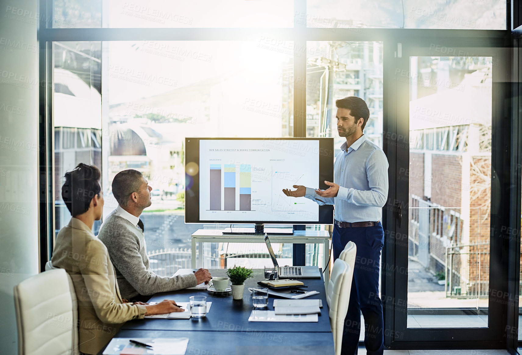 Buy stock photo Shot of a businessman giving a presentation in the boardroom