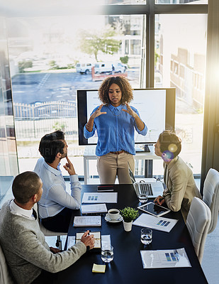 Buy stock photo Shot of a businesswoman giving a presentation in the boardroom