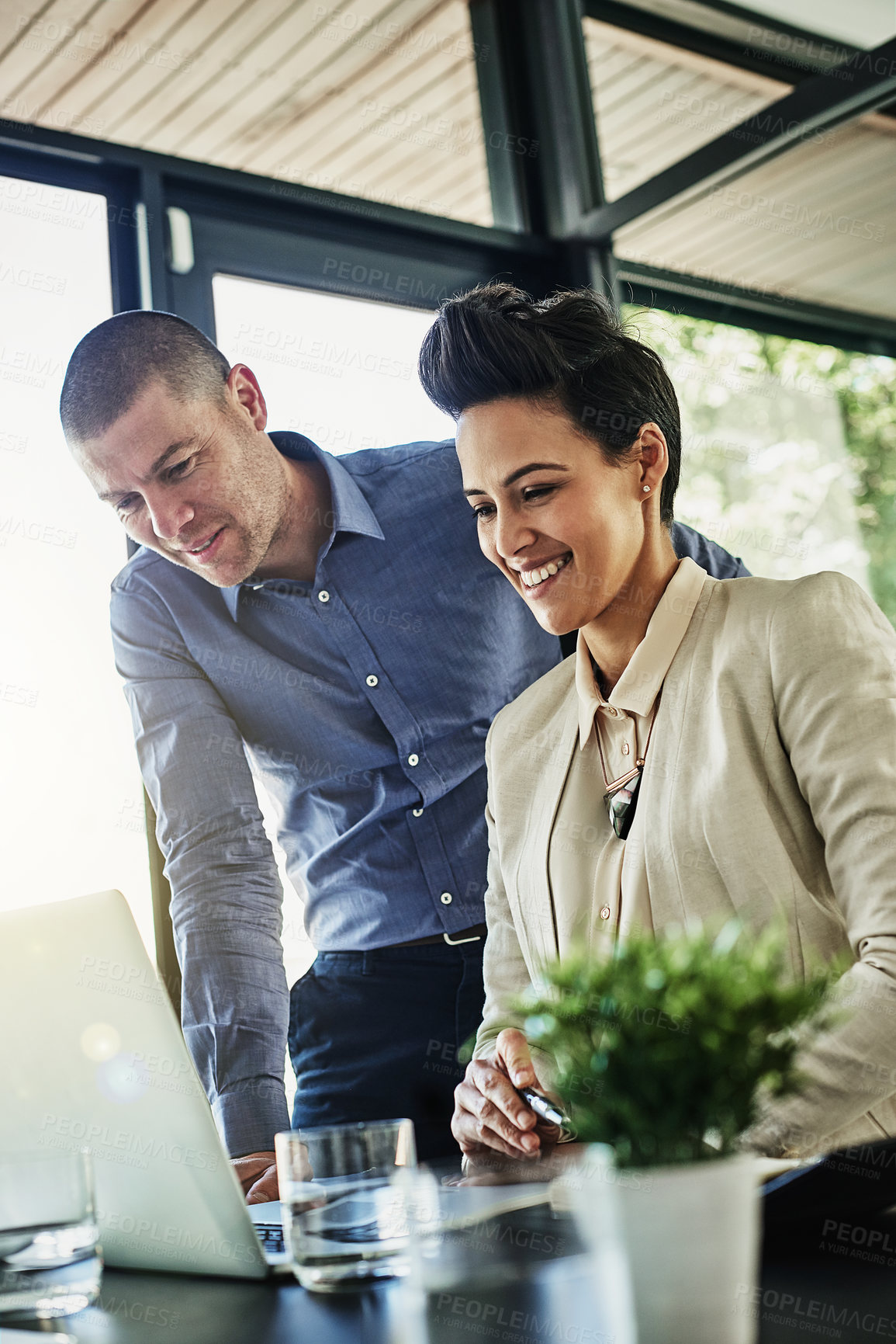 Buy stock photo Reading, online and people with laptop, office and market research on web, teamwork and copywriting. Low angle, copywriter and colleagues with tech for article, meeting and collaboration for campaign