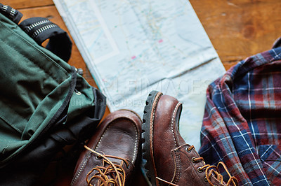 Buy stock photo Shot of hiking gear arranged on a table