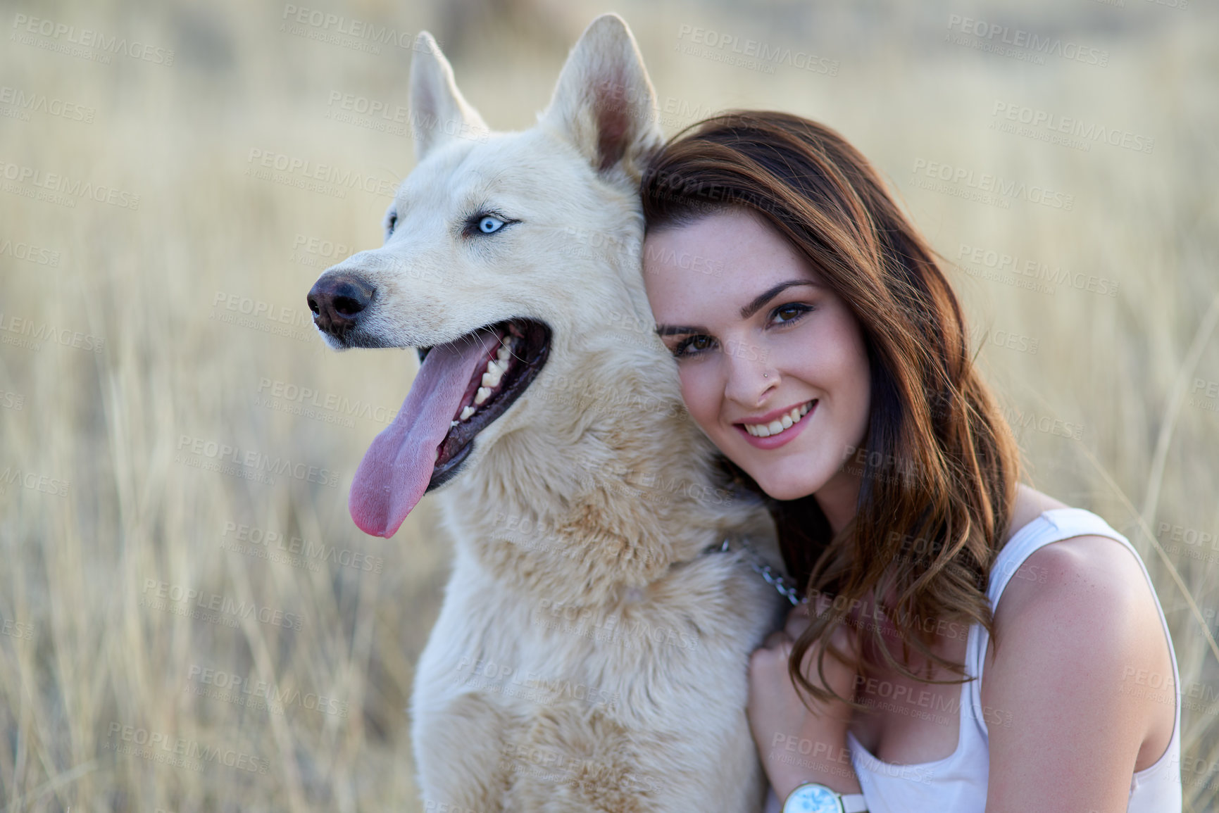 Buy stock photo Smile, portrait or woman hug dog in field for travel, adventure or behaviour training while bonding in nature together. Puppy, love or girl with calm pet Husky in a park with care, support and trust