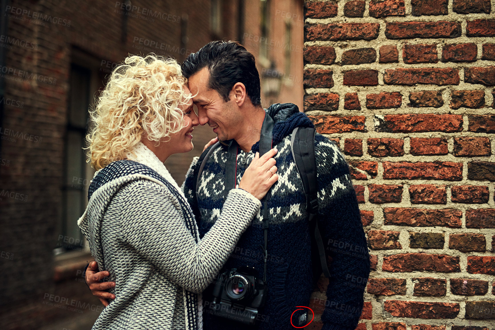 Buy stock photo Cropped shot of an affectionate young couple enjoying their time on vacation