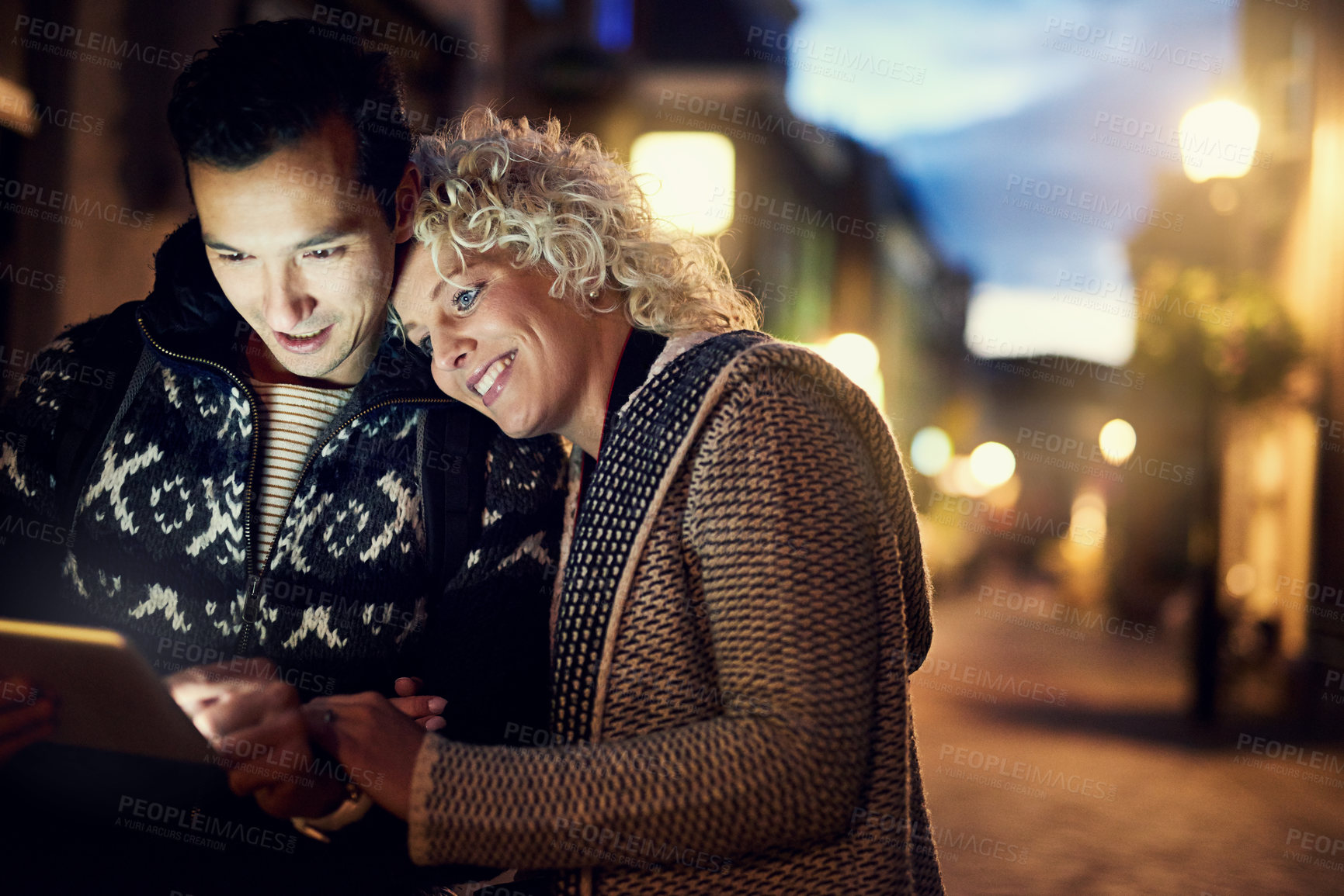 Buy stock photo Happy, tourist couple and hug with tablet for travel, gps and directions to restaurant destination in Italy. Excited, man and woman with technology for help, guidance and support in foreign country