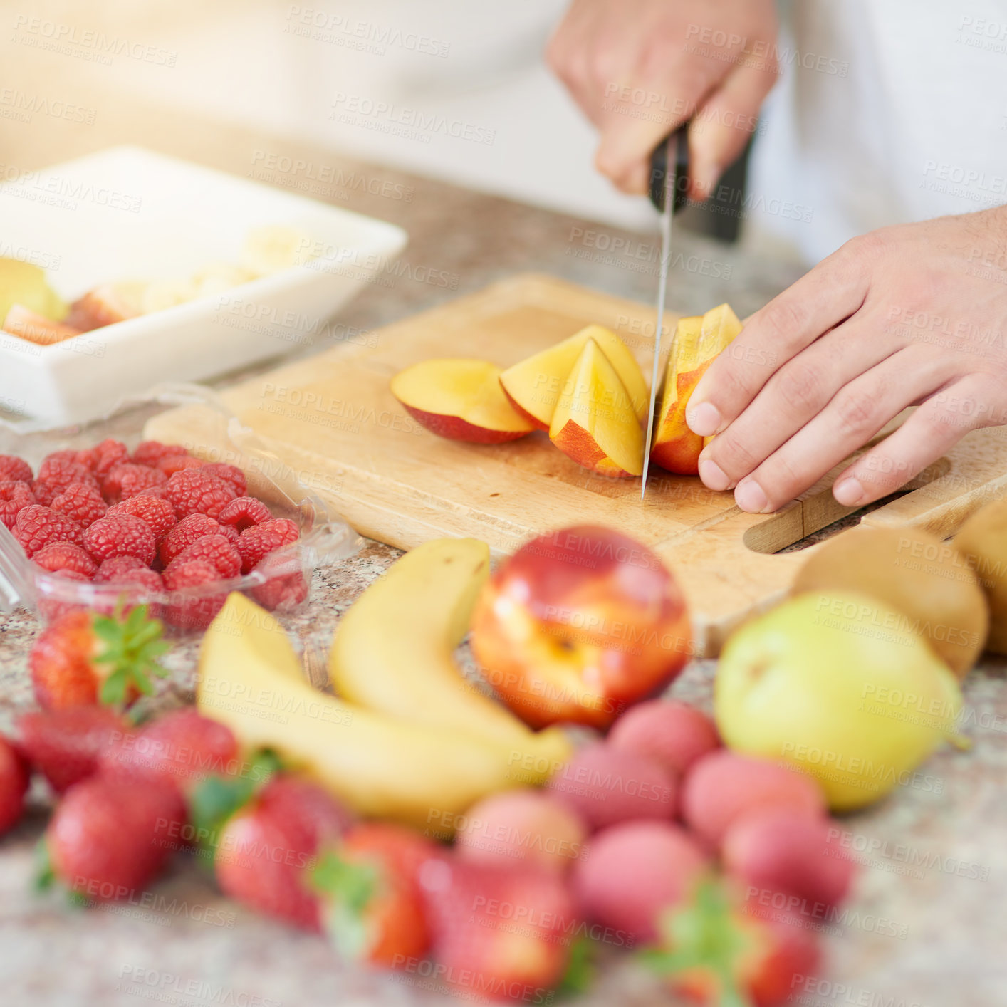 Buy stock photo Person, hands and closeup of knife for fruit with breakfast in kitchen with cutting, healthy meal and nutrition in home. Cooking, wellness and preparation of organic brunch for detox and vegan diet