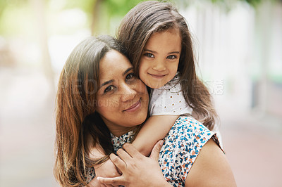 Buy stock photo Portrait of a mother and daughter bonding together outside