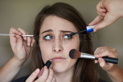 Buy stock photo Woman, nervous and hands for makeup, makeover and stress for cosmetic beauty results. Model, tools and brushes for cosmetology, products and lipstick or foundation confused or doubt for aesthetic