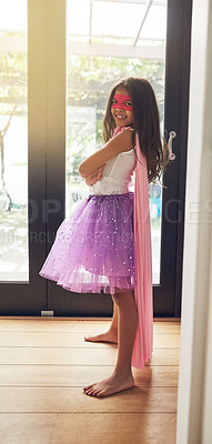 Buy stock photo Portrait, fantasy and girl with superhero costume for freedom, justice and creative clothes for halloween. Female kid, happy and cosplay for protection or stop crime with child development in home