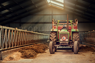 Buy stock photo Farm, tractor and old machine in barn with dirt, rust and dust in storage warehouse on land. Vintage, retro and plow truck in abandoned factory shed or tools for farming production or agriculture