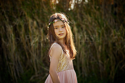 Buy stock photo Portrait of a cute little girl in a flower crown playing outside