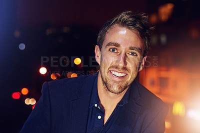 Buy stock photo Portrait of a happy young man posing alone on the balcony of a nightclub
