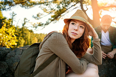 Buy stock photo Shot of two young people hiking while on an overseas trip