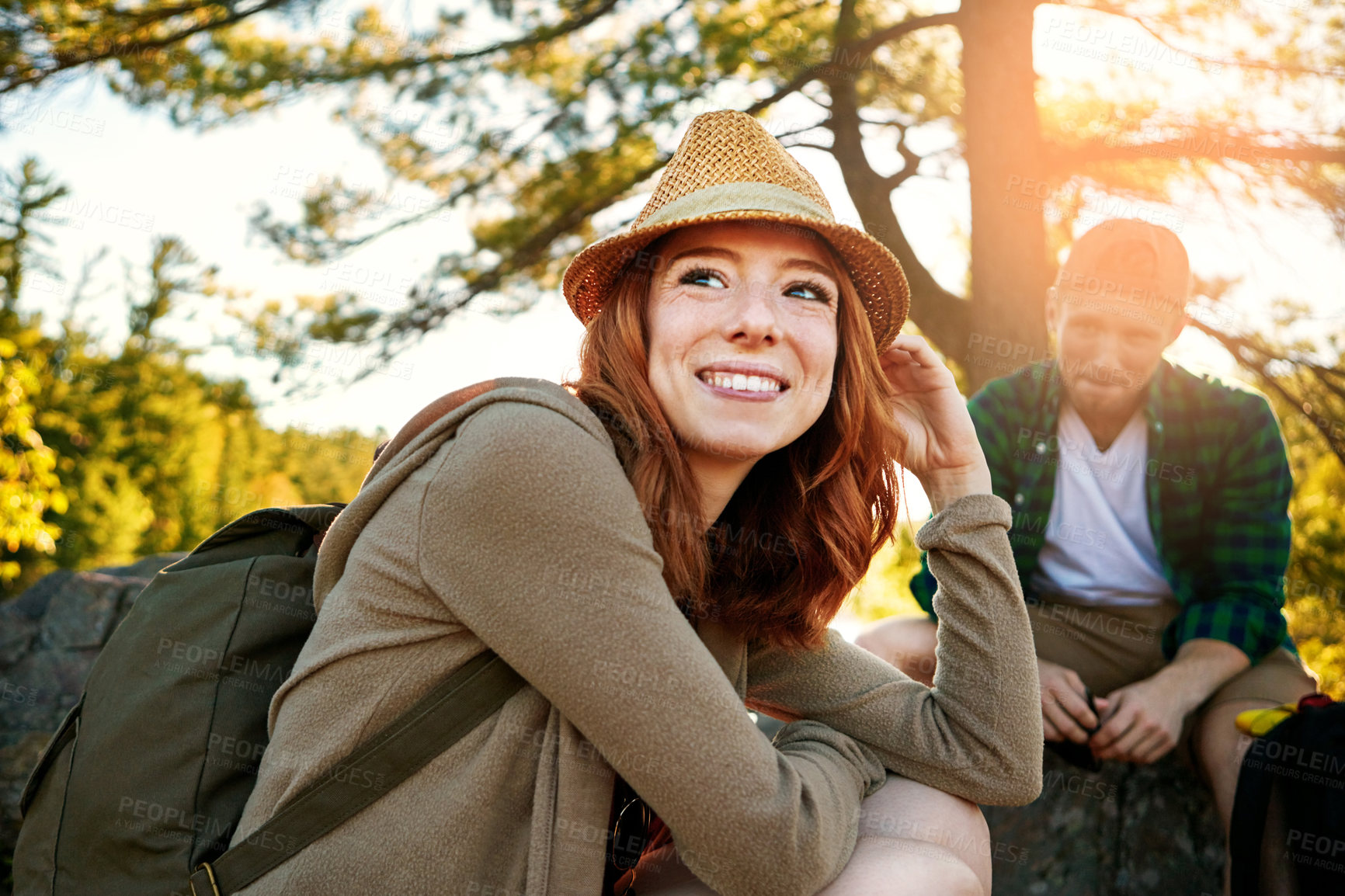 Buy stock photo Shot of two young people hiking while on an overseas trip