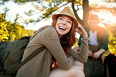 Buy stock photo Shot of two young people hiking while on an overseas trip