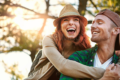 Buy stock photo Shot of an affectionate young couple hiking while on an overseas trip