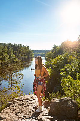 Buy stock photo Shot of a young woman out hiking