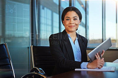 Buy stock photo Cropped shot of a businesswoman taking notes while using her tablet