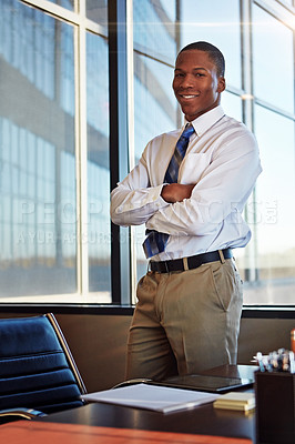 Buy stock photo Portrait of a young male lawyer standing by his desk in the office