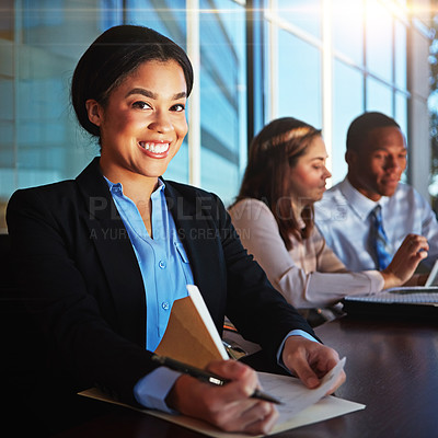 Buy stock photo Cropped portrait of a young businesswoman sitting in a meeting with her boardroom
