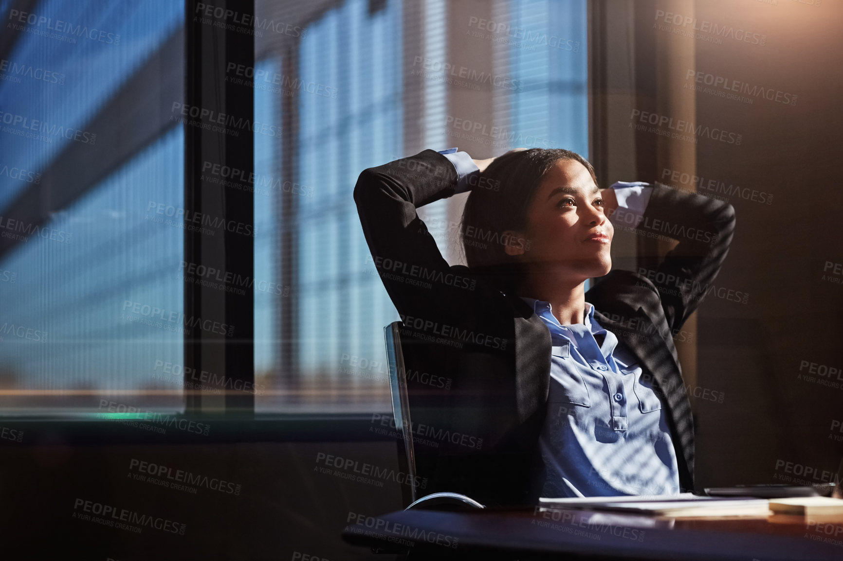 Buy stock photo Cropped shot of a businesswoman sitting thoughtfully in her office