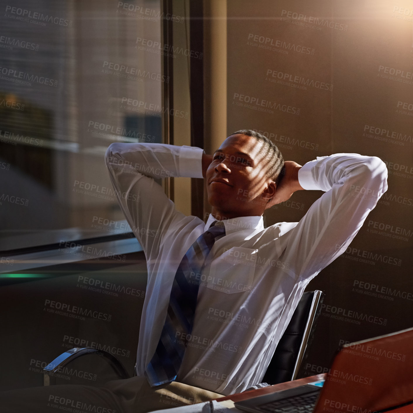 Buy stock photo Cropped shot of a businessman sitting thoughtfully in his office