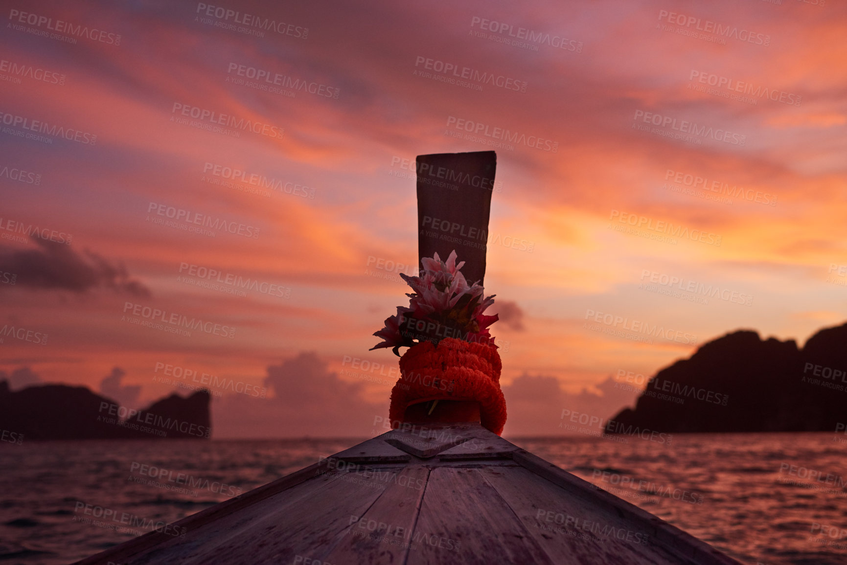 Buy stock photo Shot of the stern of a boat at sunset
