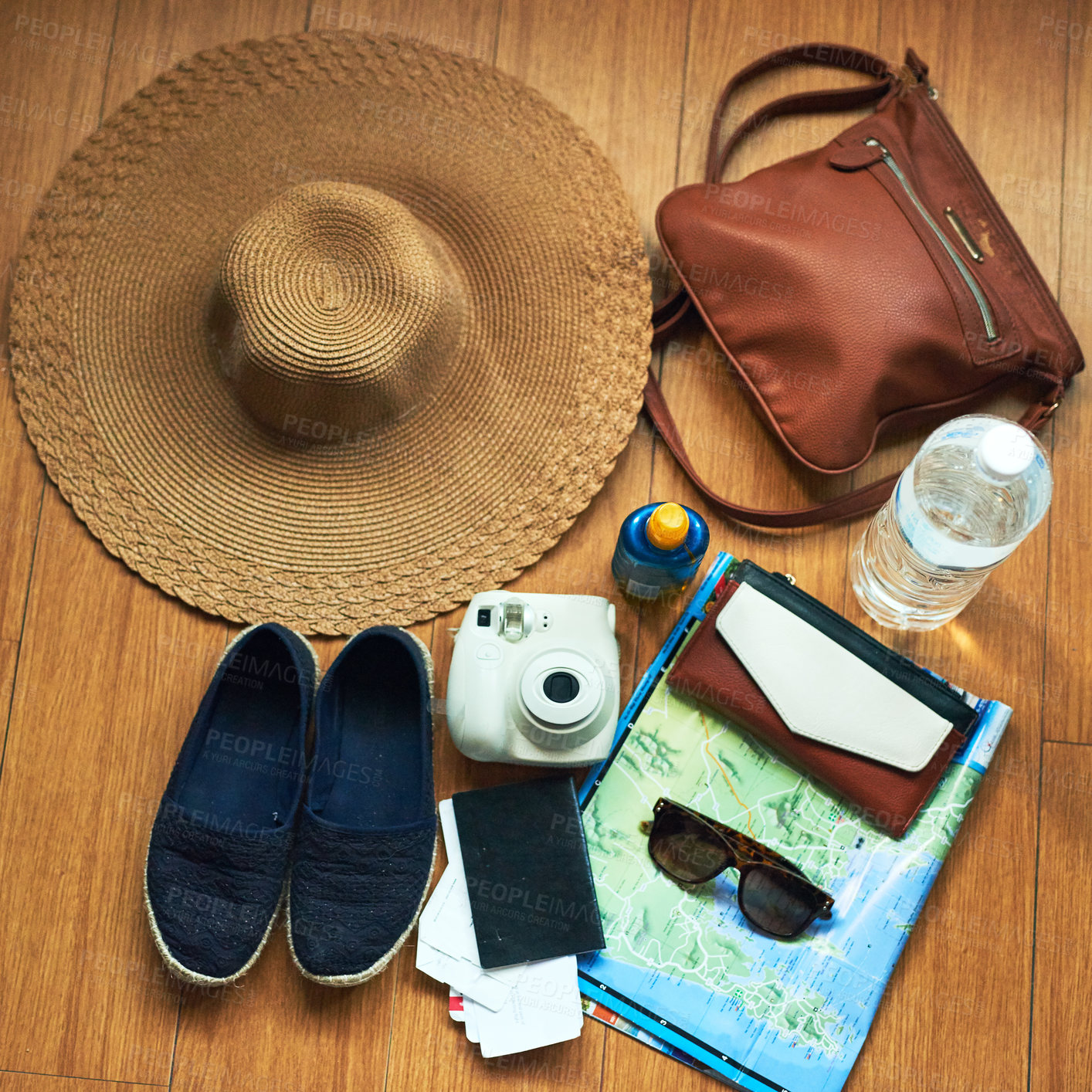 Buy stock photo High angle shot of travelling essentials on a table